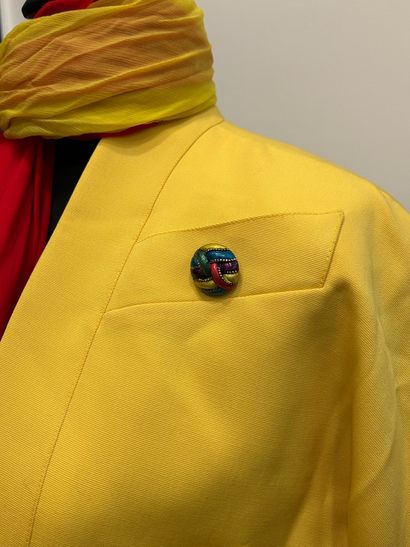 LILIANE ROMI 
Yellow silk and polyester bolero...
