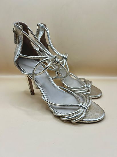 SANDRO 
Heeled sandals in gold-tone leather,...
