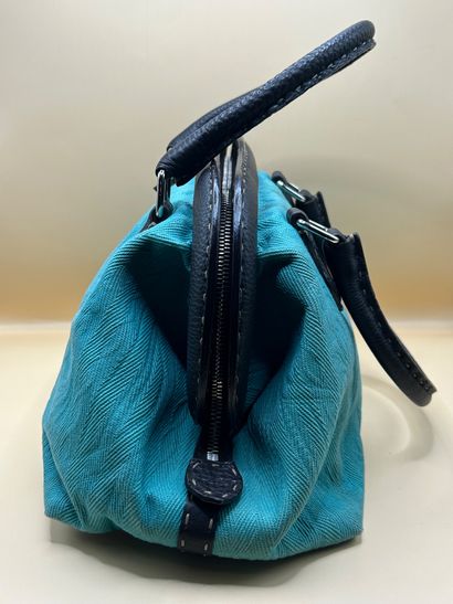 FENDI
Handbag in turquoise canvas and brown...
