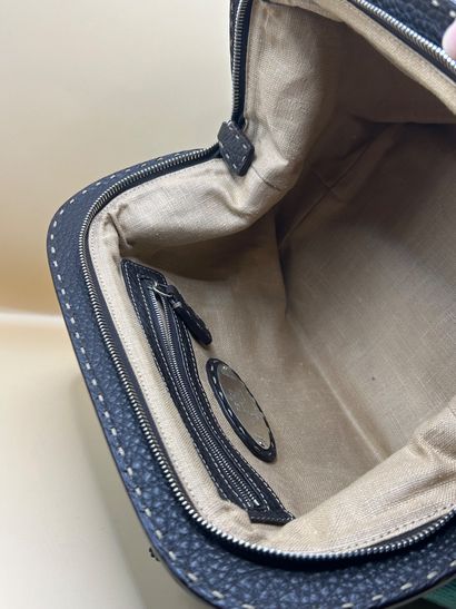 FENDI
Handbag in turquoise canvas and brown...