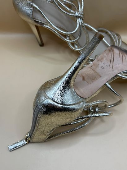 SANDRO 
Heeled sandals in gold-tone leather,...