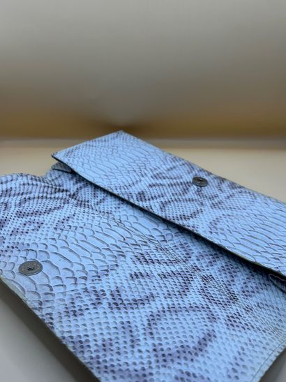 MIKA SAROLEA
Circa 2000
Cream python clutch...