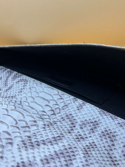 MIKA SAROLEA
Circa 2000
Cream python clutch...