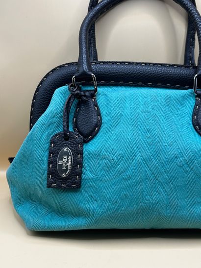 FENDI
Handbag in turquoise canvas and brown...