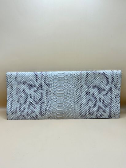 MIKA SAROLEA
Circa 2000
Cream python clutch...