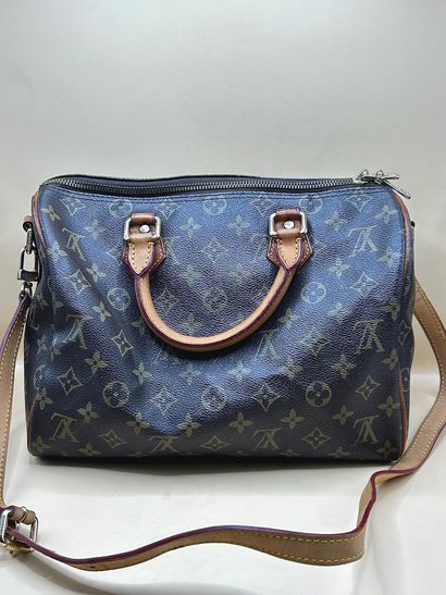 LOUIS VUITTON 
Sac à main modèle 