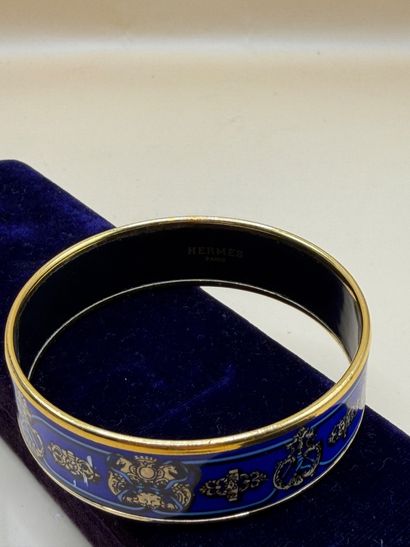 HERMÈS 
Bracelet jonc en métal doré à décor...