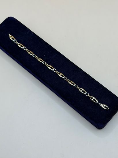 Original bracelet en deux tons d'or jaune...