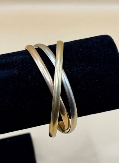 Bracelet triple jonc aux trois ors jaune,...