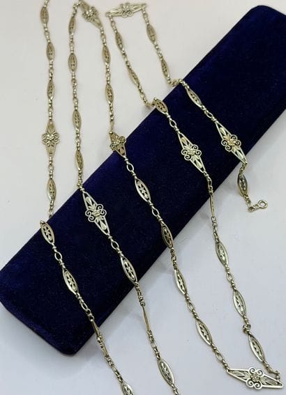 Sautoir en or jaune 18 carats (750/1000)...