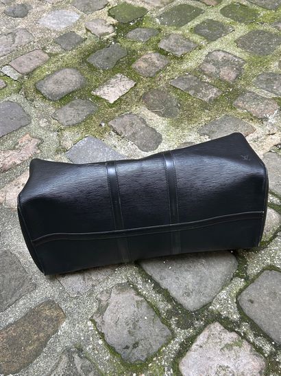 LOUIS VUITTON 
Sac de voyage 