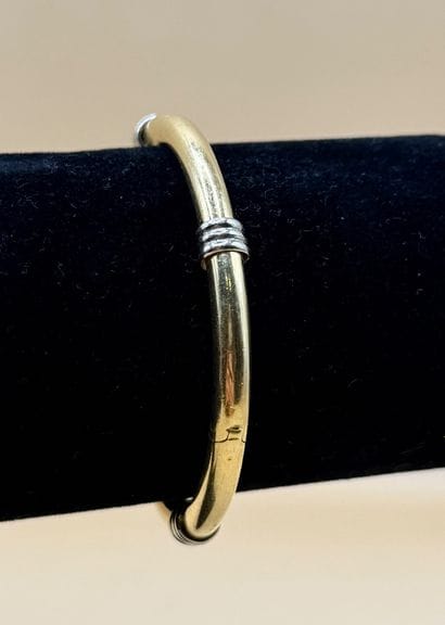 FRED, dans le goût de 
Bracelet jonc en or...