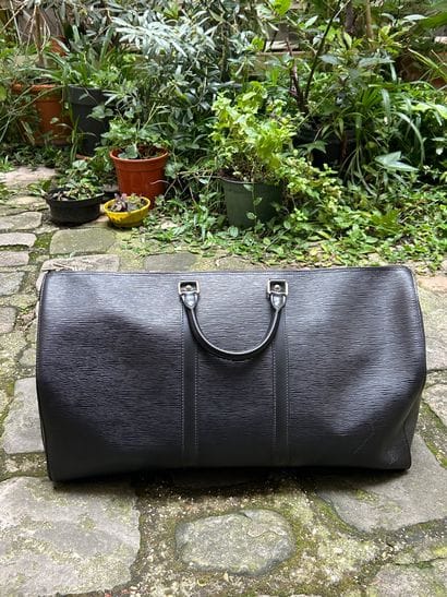 LOUIS VUITTON 
Sac de voyage 