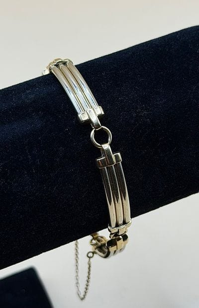 Bracelet en or jaune et gris 18 carats (750/1000),...