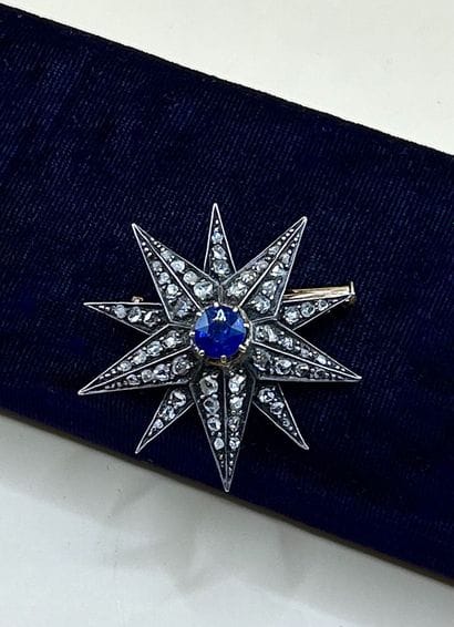 Délicate broche en argent (min. 800/1000)...
