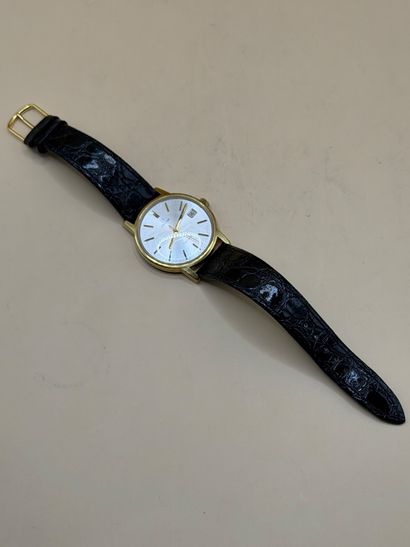 OMEGA
Geneva
Metal and gilt metal dress watch...
