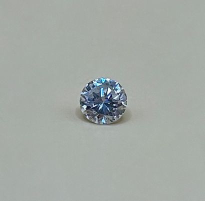 A modern-cut diamond on paper weighing 0.75...