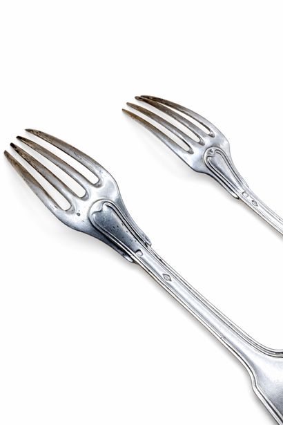 Two mismatched forks in silver (950/1000),...