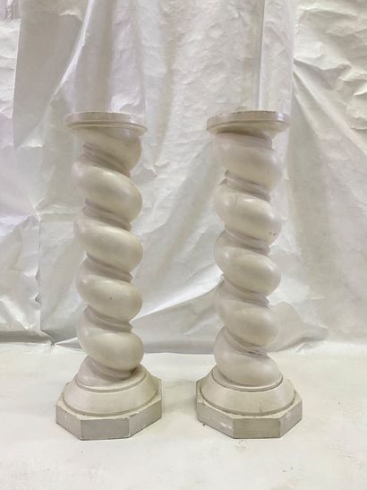 Pair of twisted columns in white lacquered...