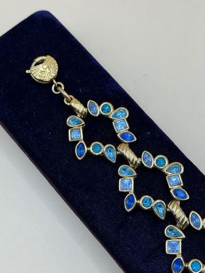 YVES SAINT LAURENT 
Elegant openwork bracelet...