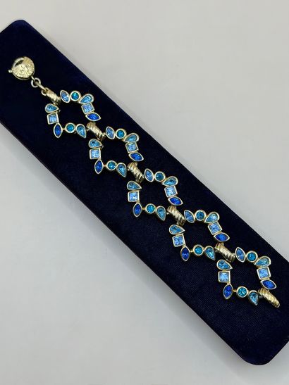 YVES SAINT LAURENT 
Elegant openwork bracelet...