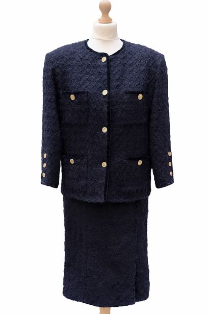 CHANEL 
Elegant and timeless skirt suit model...