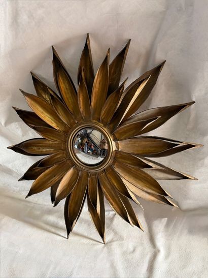 Large gilt metal sunburst mirror. 
Circa...