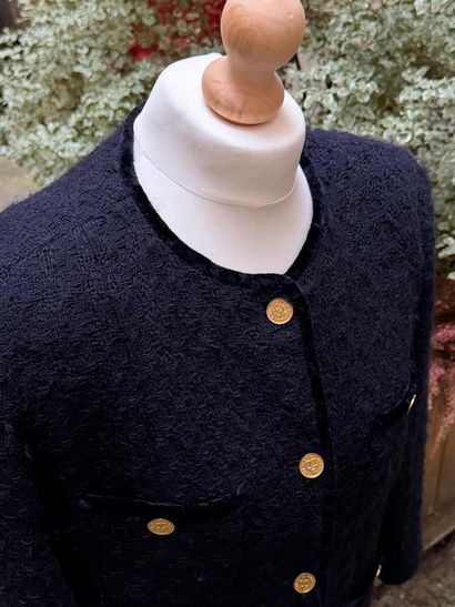 CHANEL 
Elegant and timeless skirt suit model...