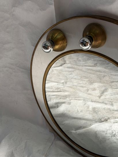 Circular mirror in partially gilded metal,...