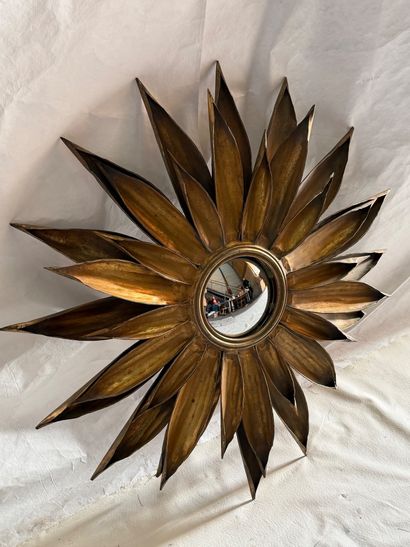 Large gilt metal sunburst mirror. 
Circa...