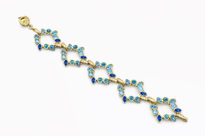 YVES SAINT LAURENT 
Elegant openwork bracelet...