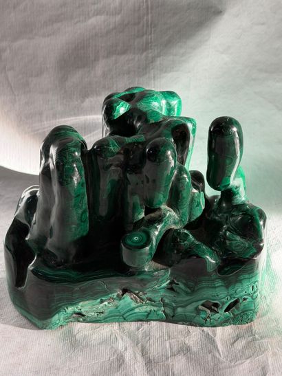 Free-form group in carved malachite. 
20th...