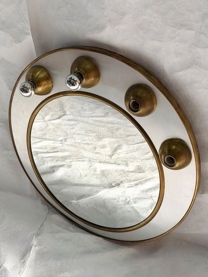 Circular mirror in partially gilded metal,...