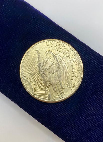 Liberty 1928 US $20 gold coin. 

Lot sold...