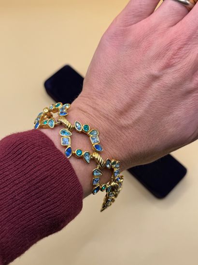 YVES SAINT LAURENT 
Elegant openwork bracelet...
