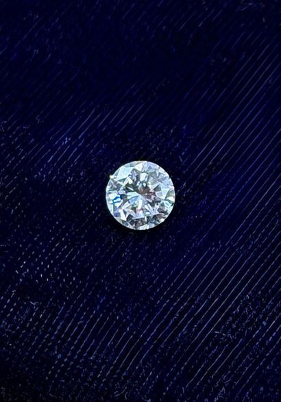 A modern-cut diamond on paper weighing 0.75...
