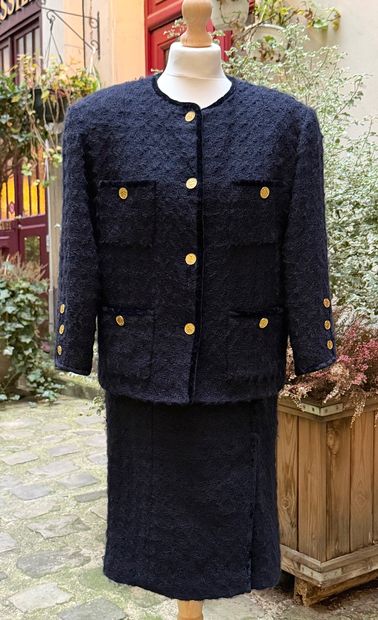 CHANEL 
Elegant and timeless skirt suit model...