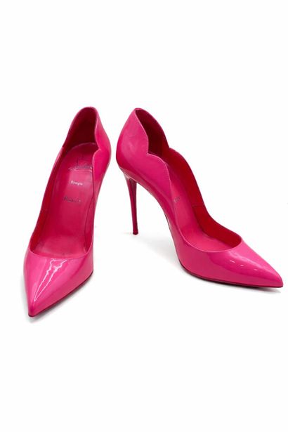 CHRISTIAN LOUBOUTIN 
Pair of hot pink patent...