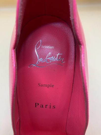 CHRISTIAN LOUBOUTIN 
Pair of hot pink patent...