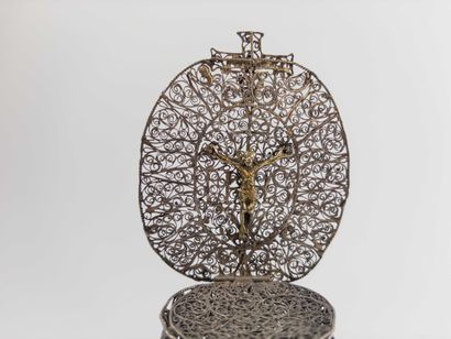 Stoup. 
Resting on three curved feet. The...