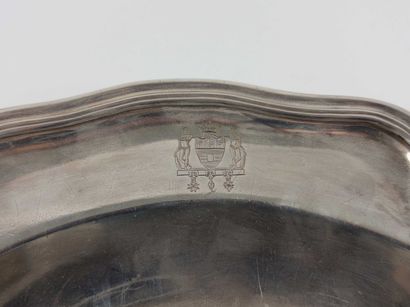 Lille.
Top with scalloped and molded edges....