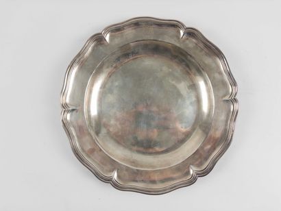 Lille.
Top with scalloped and molded edges....