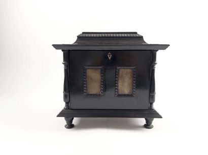 Small cabinet.
Resting on four small turned...
