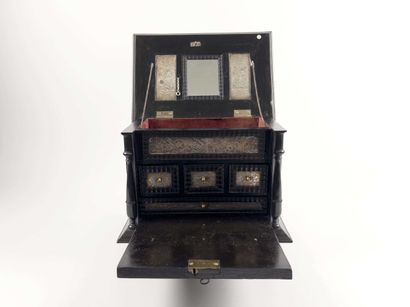 Small cabinet.
Resting on four small turned...