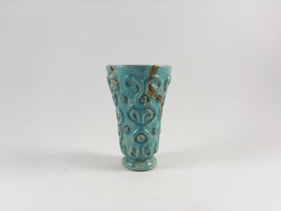 Horn vase. 
Decorated with scrolls and flowers....