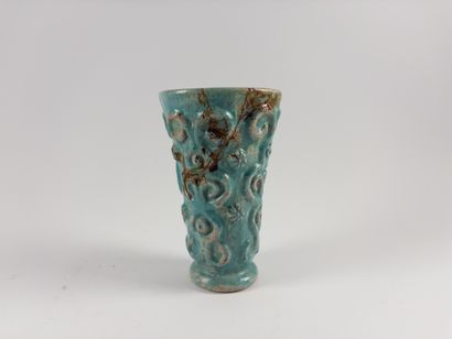 Horn vase. 
Decorated with scrolls and flowers....