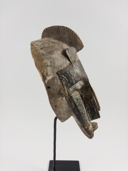 Marka.
Ntombo face mask. Wood trimmed with...