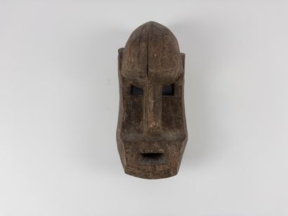 Dogon. 
Mask. Carved wood. Mali. Height :...