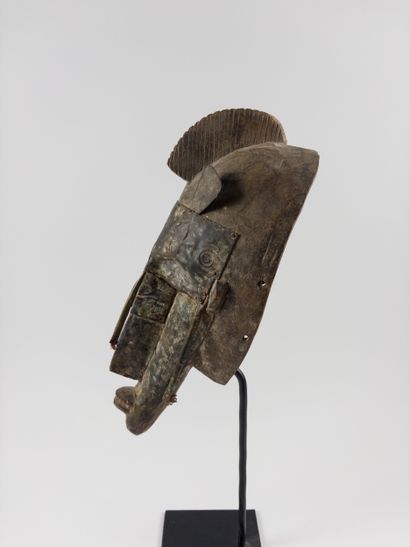 Marka.
Ntombo face mask. Wood trimmed with...