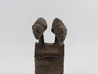 Luba.
Lamellophone. Carved wood mounted on...